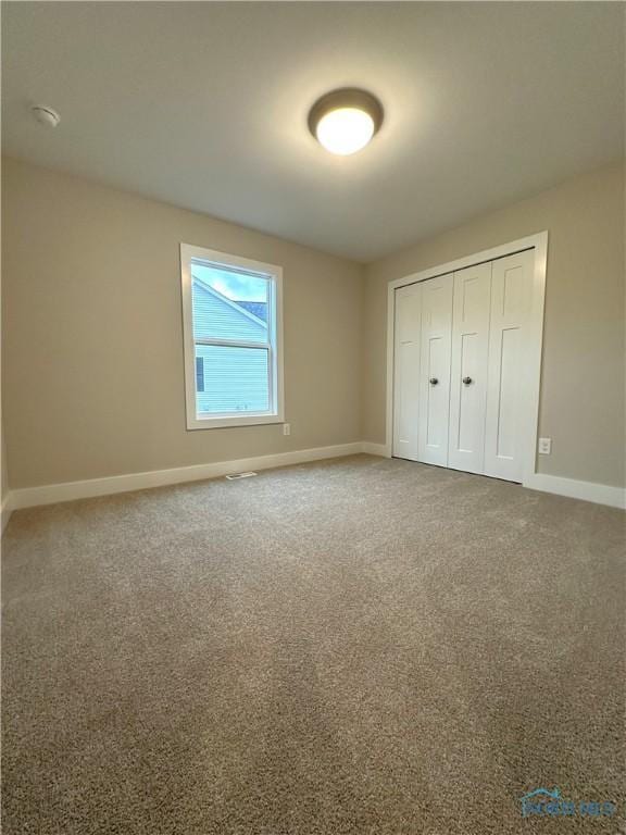 7811 Sonoma Dr, Monclova, OH 43542 - unfurnished bedroom with a closet and carpet floors