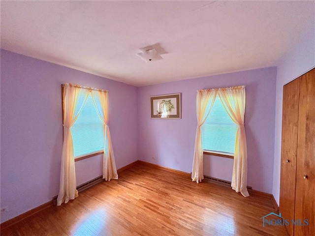 237 Pontious Pl, Napoleon, OH 43545 - unfurnished room featuring light wood-type flooring
