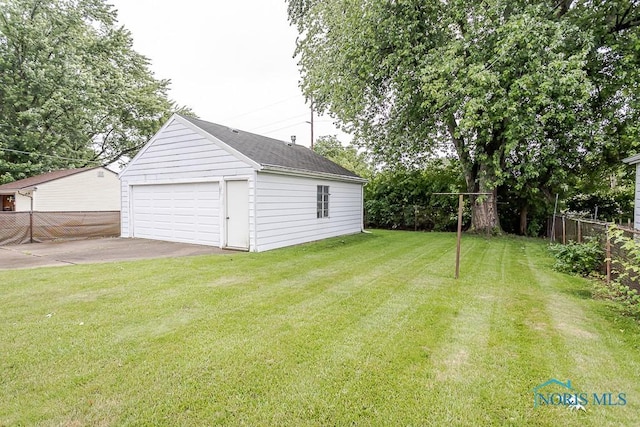 564 Southfield Dr, Maumee, OH 43537 - view of yard with an outbuilding and a detached garage