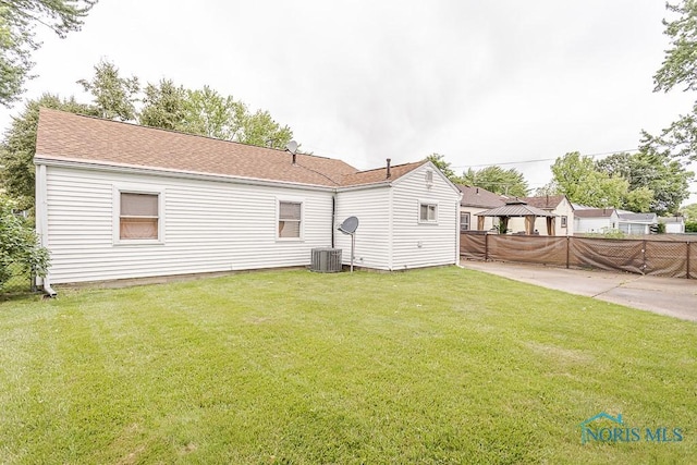 564 Southfield Dr, Maumee, OH 43537 - back of house featuring a gazebo, a patio area, and roof with shingles