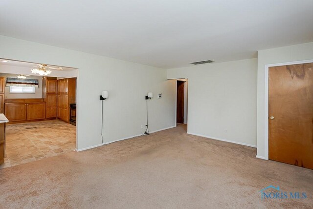 564 Southfield Dr, Maumee, OH 43537 - empty room with light carpet and baseboards