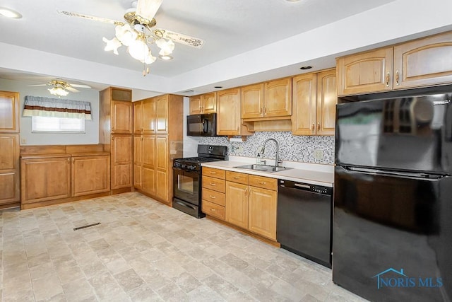 564 Southfield Dr, Maumee, OH 43537 - kitchen featuring black appliances, a ceiling fan, light countertops, and backsplash