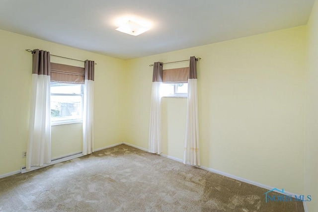 564 Southfield Dr, Maumee, OH 43537 - carpeted empty room featuring baseboards