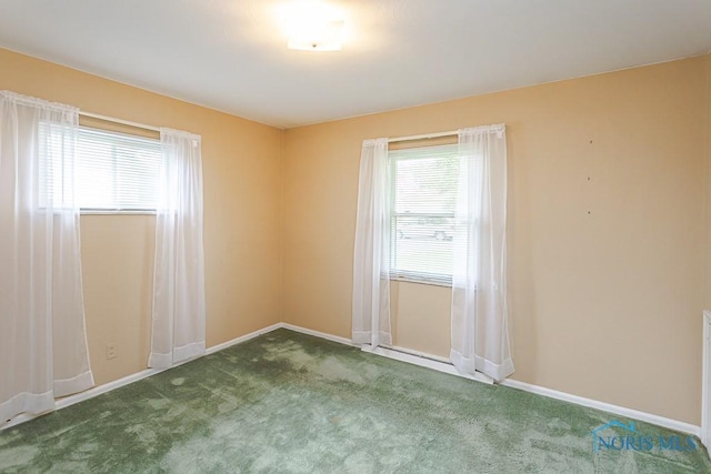 564 Southfield Dr, Maumee, OH 43537 - spare room with carpet flooring and baseboards