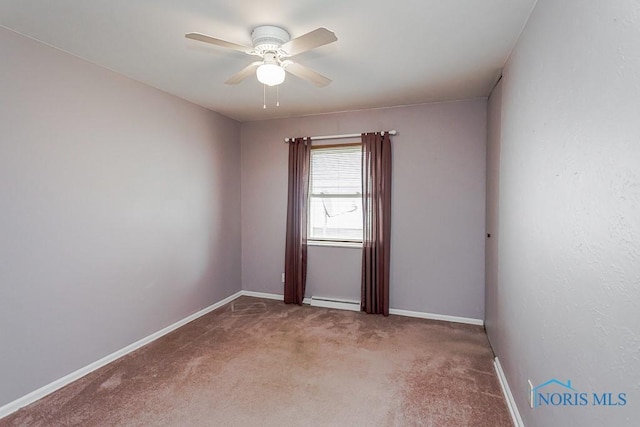 564 Southfield Dr, Maumee, OH 43537 - carpeted spare room featuring a baseboard radiator and ceiling fan