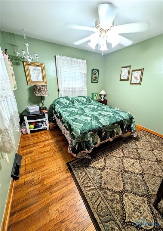 328 W Prentiss Ave, Findlay, OH 45840 - bedroom featuring wood finished floors and a ceiling fan