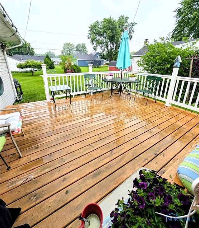 328 W Prentiss Ave, Findlay, OH 45840 - deck with outdoor dining area and a lawn