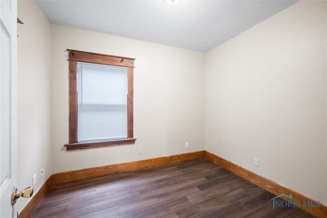 1930 Berkshire Pl, Toledo, OH 43613 - unfurnished room featuring dark wood finished floors and baseboards