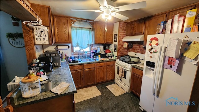 403 W Chestnut St, Wauseon, OH 43567 - kitchen with white appliances, under cabinet range hood, brown cabinets, a ceiling fan, and backsplash