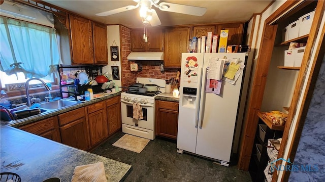 403 W Chestnut St, Wauseon, OH 43567 - kitchen featuring white appliances, custom range hood, brown cabinets, a ceiling fan, and decorative backsplash