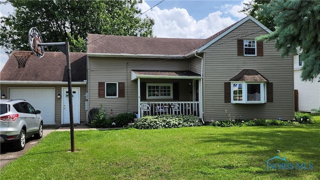 403 W Chestnut St, Wauseon, OH 43567 - traditional-style home featuring a garage, a front lawn, covered porch, and roof with shingles