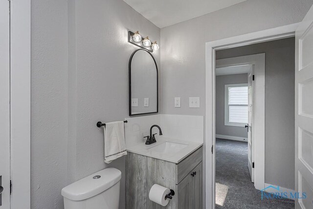 2242 Vaness Dr, Toledo, OH 43615 - half bath featuring vanity and toilet