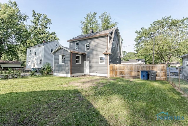 2242 Vaness Dr, Toledo, OH 43615 - rear view of property featuring a fenced backyard
