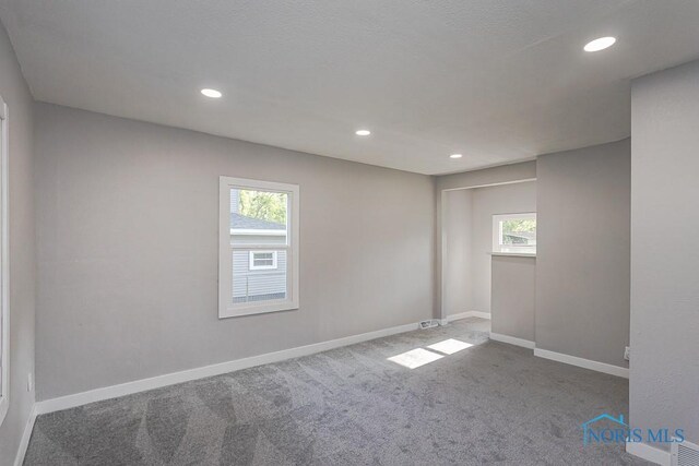 2242 Vaness Dr, Toledo, OH 43615 - carpeted spare room with healthy amount of natural light and recessed lighting