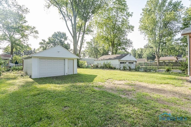 2242 Vaness Dr, Toledo, OH 43615 - view of yard with a garage and an outdoor structure