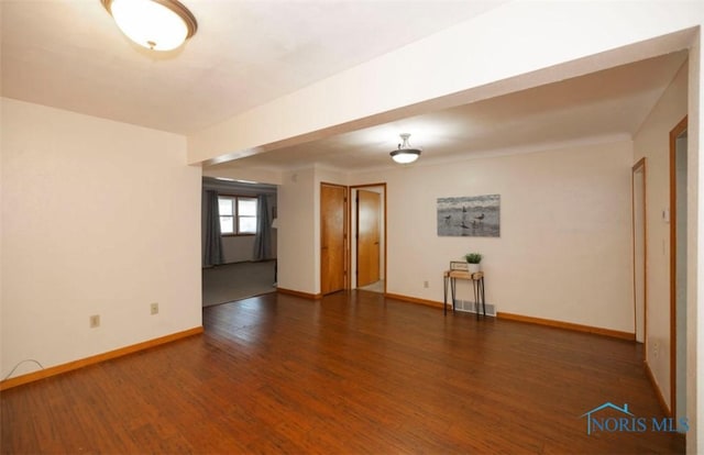 404 E Garfield Ave, Swanton, OH 43558 - unfurnished room featuring wood finished floors and baseboards