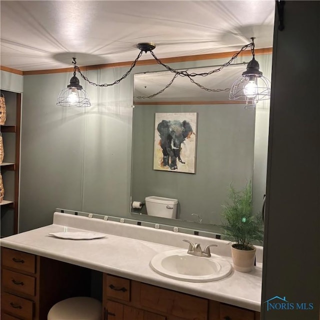 404 E Garfield Ave, Swanton, OH 43558 - bathroom with double vanity and ornamental molding