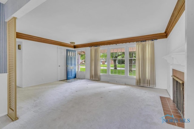 3733 Shamrock Dr, Toledo, OH 43615 - unfurnished living room featuring carpet floors and a fireplace with flush hearth