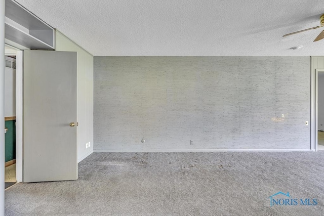 3733 Shamrock Dr, Toledo, OH 43615 - carpeted empty room with a ceiling fan and a textured ceiling