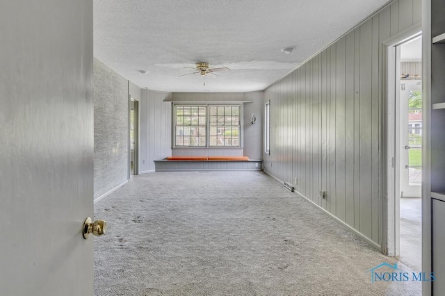 3733 Shamrock Dr, Toledo, OH 43615 - empty room with a ceiling fan, carpet, and a textured ceiling