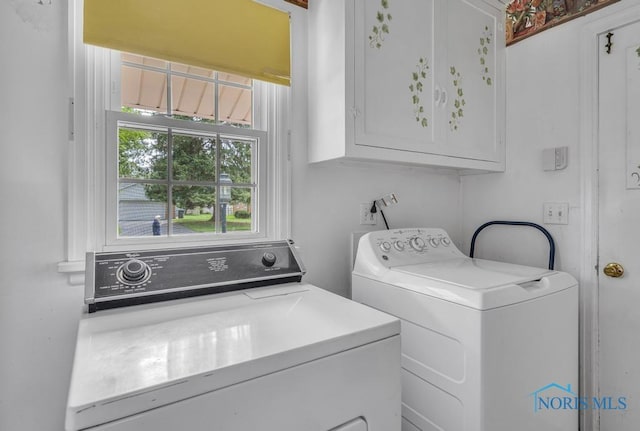 3733 Shamrock Dr, Toledo, OH 43615 - washroom with washer and dryer and cabinet space