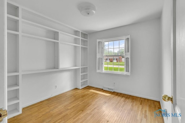 3733 Shamrock Dr, Toledo, OH 43615 - empty room with hardwood / wood-style floors and baseboards