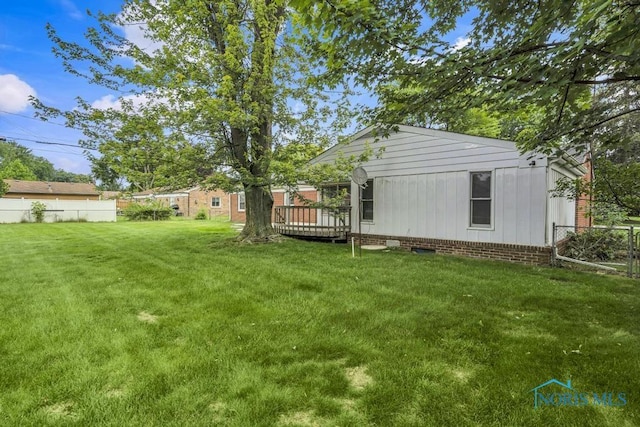 3733 Shamrock Dr, Toledo, OH 43615 - view of yard featuring a wooden deck