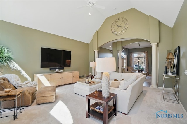 3862 Ravine Hollow Ct, Maumee, OH 43537 - living room featuring decorative columns, light colored carpet, a ceiling fan, high vaulted ceiling, and arched walkways