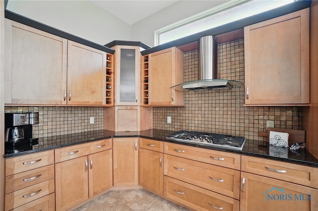 3862 Ravine Hollow Ct, Maumee, OH 43537 - kitchen featuring stainless steel gas stovetop, wall chimney exhaust hood, backsplash, and dark stone countertops
