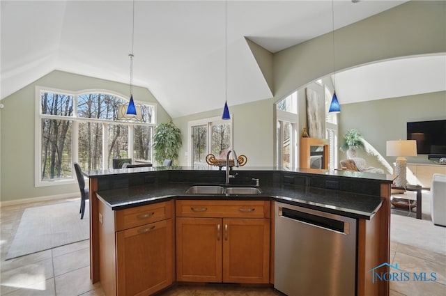 3862 Ravine Hollow Ct, Maumee, OH 43537 - kitchen featuring stainless steel dishwasher, vaulted ceiling, open floor plan, light tile patterned floors, and dark stone countertops