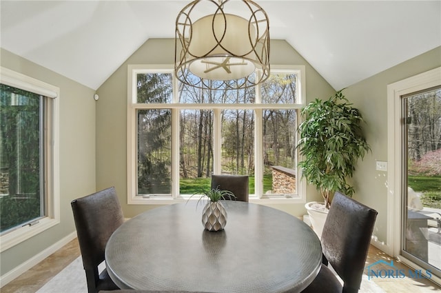 3862 Ravine Hollow Ct, Maumee, OH 43537 - dining space featuring healthy amount of natural light and vaulted ceiling