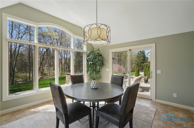 3862 Ravine Hollow Ct, Maumee, OH 43537 - dining room with lofted ceiling and healthy amount of natural light