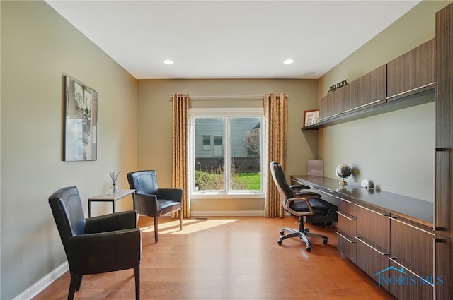 3862 Ravine Hollow Ct, Maumee, OH 43537 - home office featuring light wood finished floors, recessed lighting, and built in study area