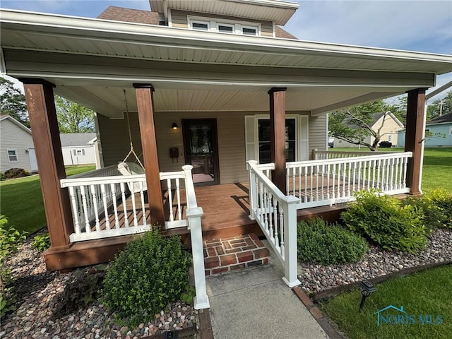 506 Ditto St, Archbold, OH 43502 - view of exterior entry featuring covered porch