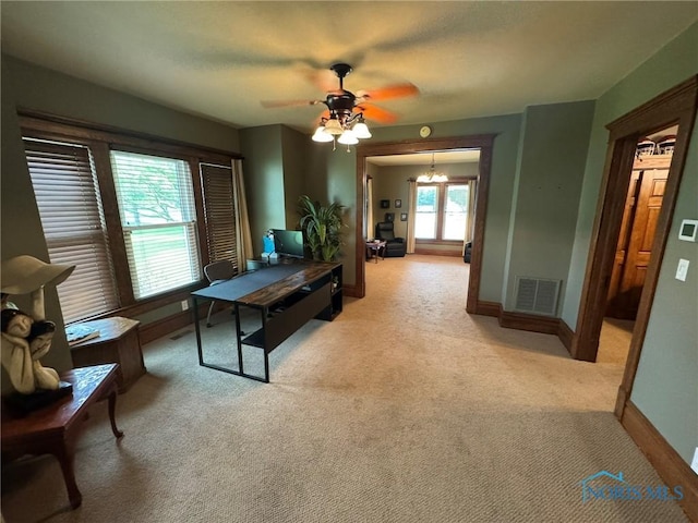 506 Ditto St, Archbold, OH 43502 - home office with a ceiling fan, light carpet, and a chandelier