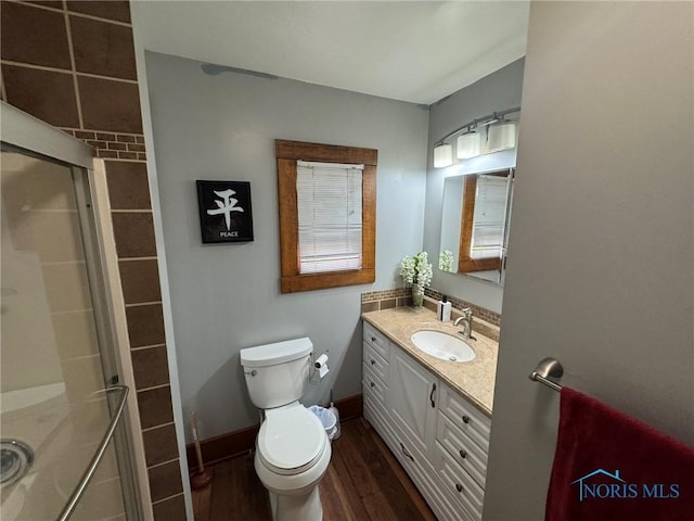 506 Ditto St, Archbold, OH 43502 - full bath with vanity, a shower stall, and wood finished floors
