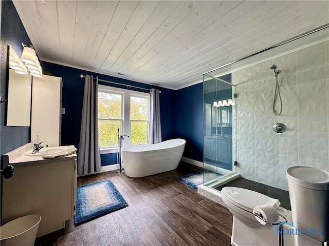 716 Davidson St, Defiance, OH 43512 - bathroom featuring vanity, a shower stall, wooden ceiling, a soaking tub, and wood finished floors