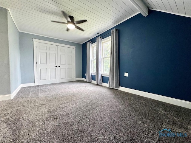 716 Davidson St, Defiance, OH 43512 - unfurnished bedroom featuring wood ceiling, carpet flooring, a closet, and ceiling fan