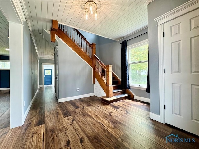716 Davidson St, Defiance, OH 43512 - stairs with wood finished floors, wood ceiling, and ornamental molding