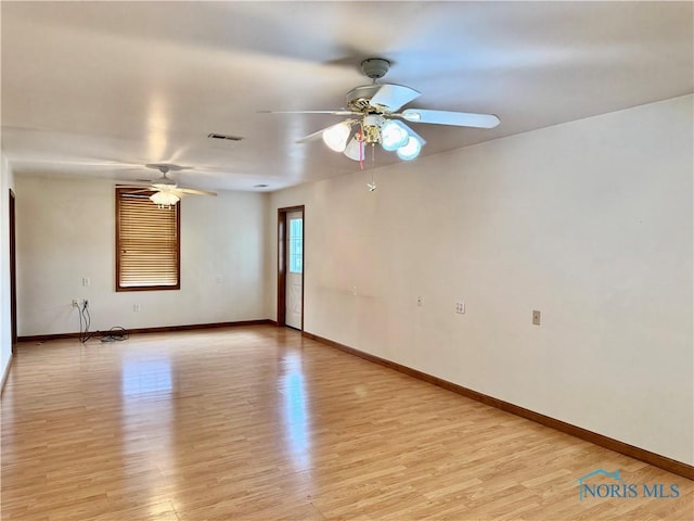 220 Rolland St, Bryan, OH 43506 - unfurnished room with ceiling fan and light wood finished floors