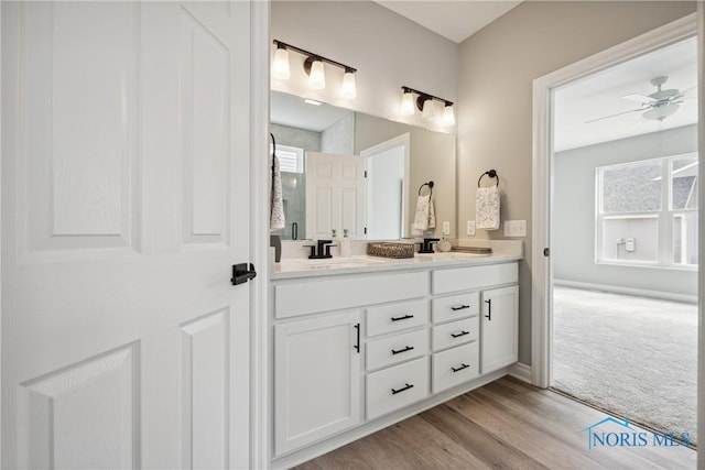 3343 Moonlit Pass, Monclova, OH 43542 - full bath with double vanity, ceiling fan, and wood finished floors