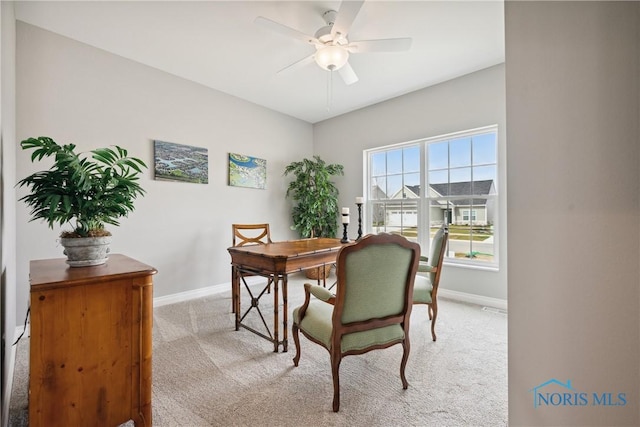 3343 Moonlit Pass, Monclova, OH 43542 - dining area with light carpet and a ceiling fan