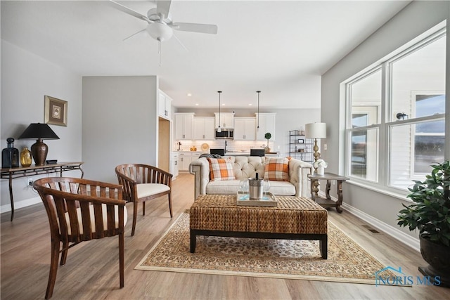 3343 Moonlit Pass, Monclova, OH 43542 - living area featuring ceiling fan, light wood-style floors, and recessed lighting