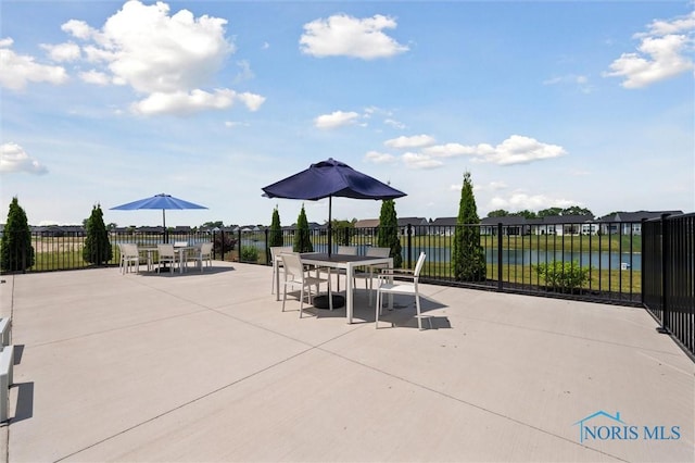 3343 Moonlit Pass, Monclova, OH 43542 - view of patio / terrace featuring outdoor dining area and a water view