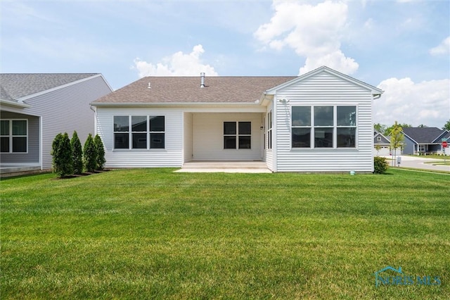 3343 Moonlit Pass, Monclova, OH 43542 - rear view of property with a patio area, a yard, and roof with shingles