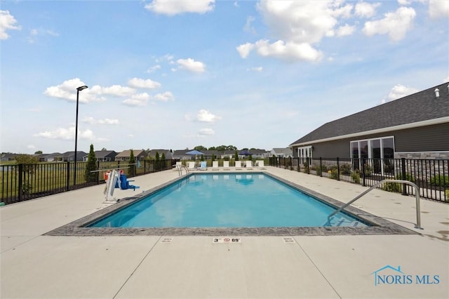 3343 Moonlit Pass, Monclova, OH 43542 - community pool with a patio and a residential view