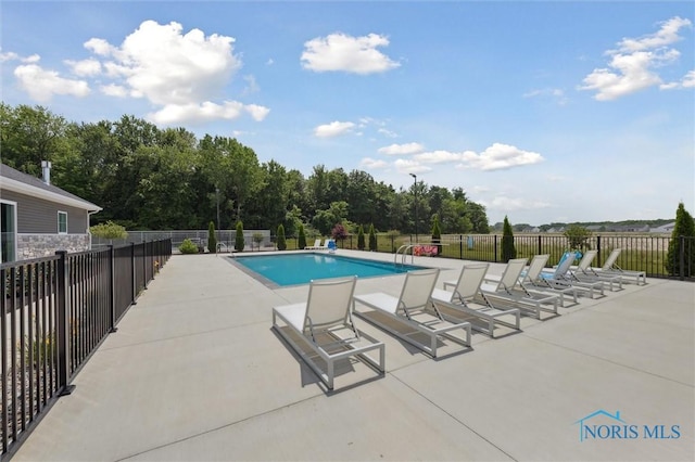 3343 Moonlit Pass, Monclova, OH 43542 - community pool featuring a patio