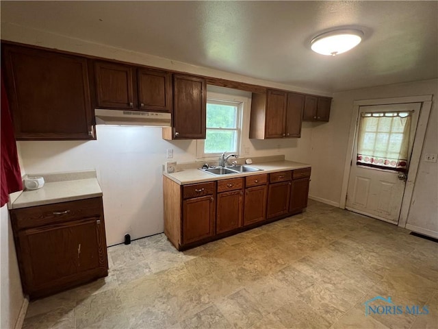 643 N 5th St, Fremont, OH 43420 - kitchen with under cabinet range hood and light countertops