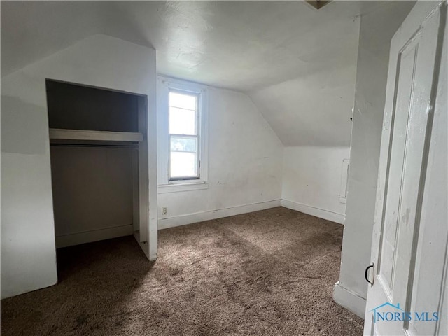 643 N 5th St, Fremont, OH 43420 - additional living space with lofted ceiling and carpet flooring