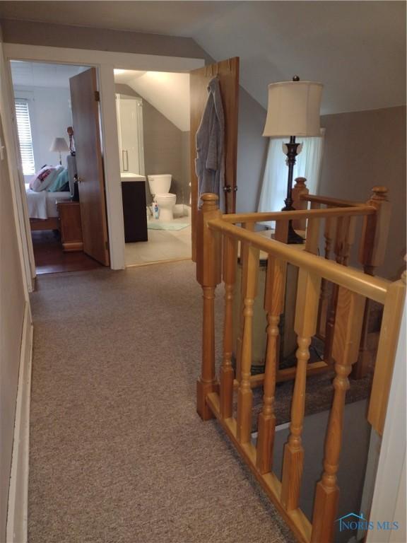 200 Pleasant St, Archbold, OH 43502 - hallway featuring an upstairs landing, carpet, and lofted ceiling